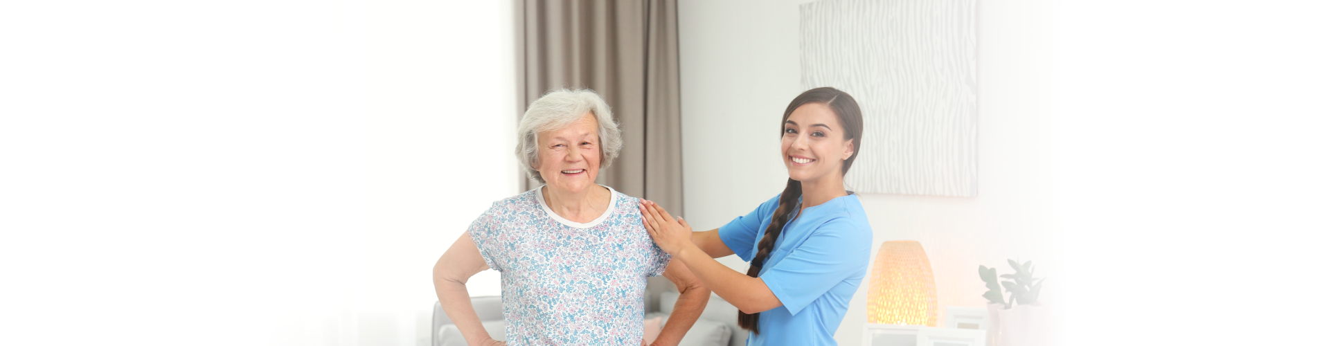 nurse helping senior woman to exercise